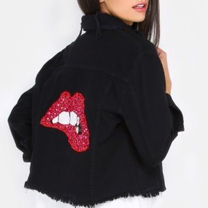 Black denim jacket with red sequined lip